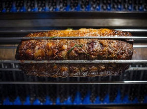 Rotisserie Standing Prime Rib. Flame Show Cooking Catering or Drop Off Catering