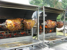 Load image into Gallery viewer, Rotisserie Whole Steamship of Beef. Flame Show Cooking Catering or Drop Off Catering
